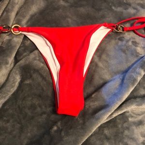Red swimming suit bottoms